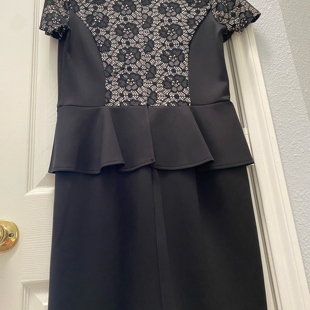 Women dress size 14 black 96 polyester 4% spandex arm to arm 20 w 17 l 38